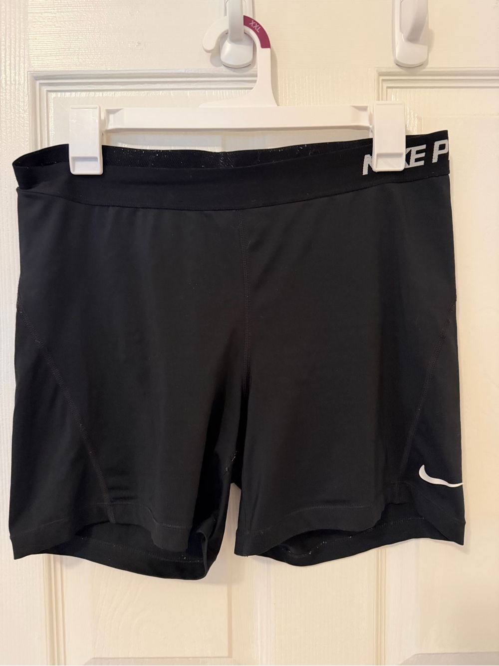Women’s Nike Pro Shorts XL fits more like a large